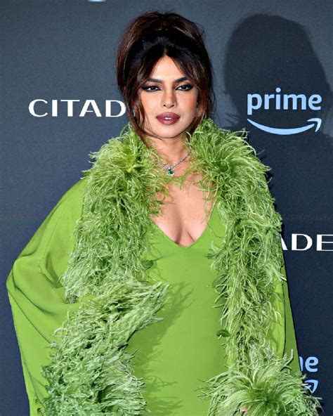 priyanka chopra topless|Priyanka Chopra exposes serious cleavage in head